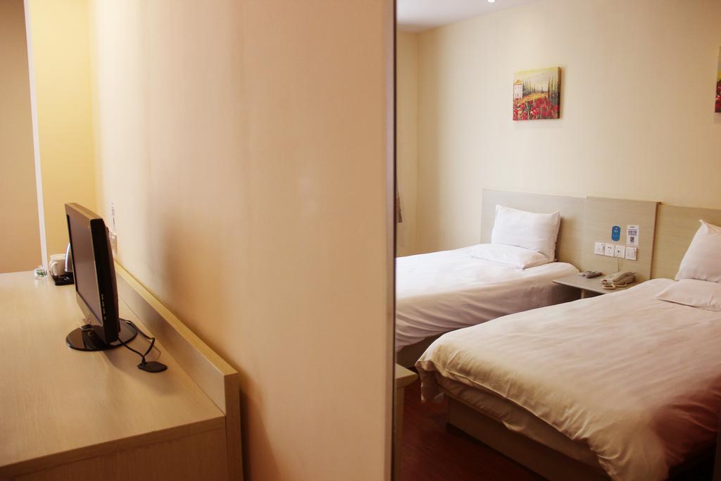 Hanting Hotel Dalian Olympic Square Hotel Номер фото